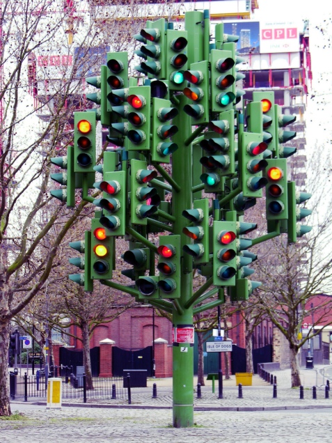A "tree" sculpture featuring over a dozen traffic lights facing all directions